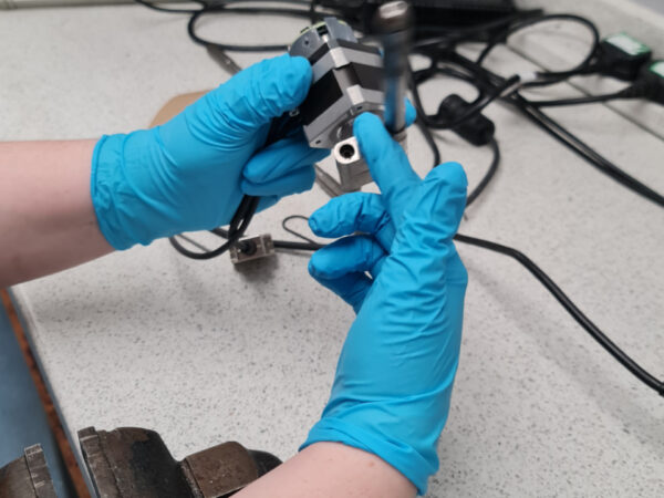 High-precision linear encoder being serviced by Encoders UK