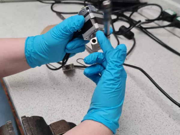 High-precision linear encoder being serviced by Encoders UK